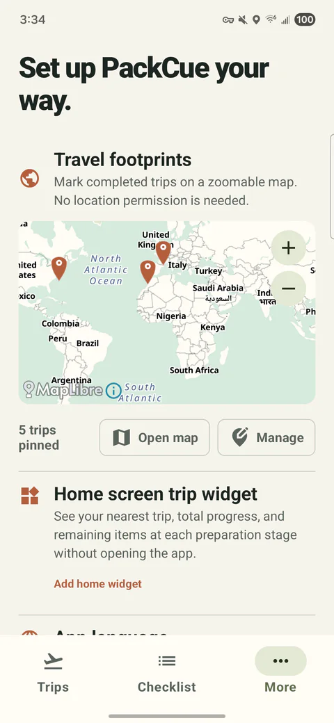 PackCue Travel footprints screen with completed trips pinned across a world map