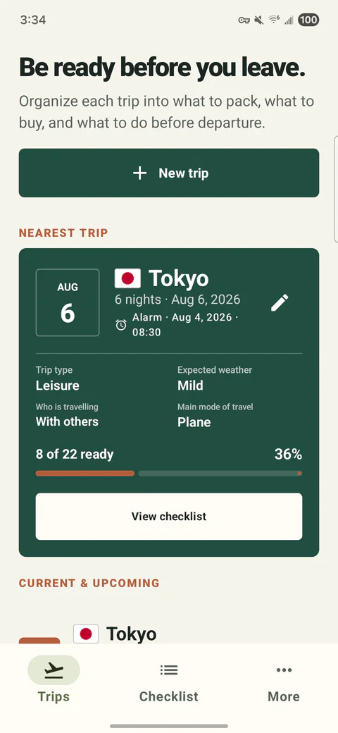 PackCue Trips screen showing a Tokyo trip, its departure alarm, trip profile and packing progress